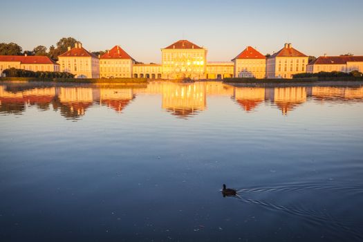 Nymphenburg palace with reflection in the morning sunlight