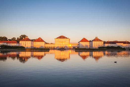 Nymphenburg palace with reflection in the morning sunlight