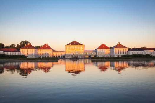 Nymphenburg palace with reflection in the morning sunlight