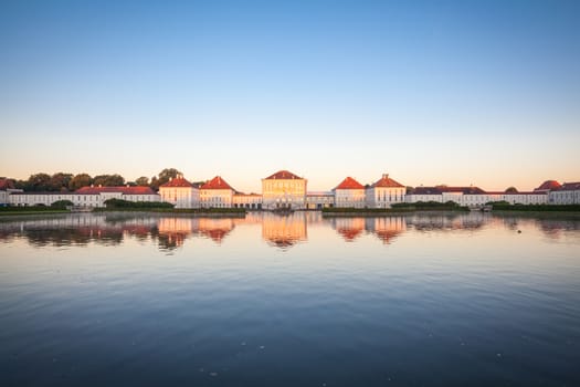 Nymphenburg palace with reflection in the morning sunlight