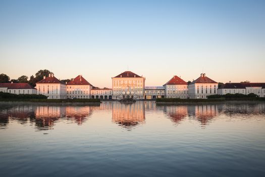 Nymphenburg palace with reflection in the morning sunlight