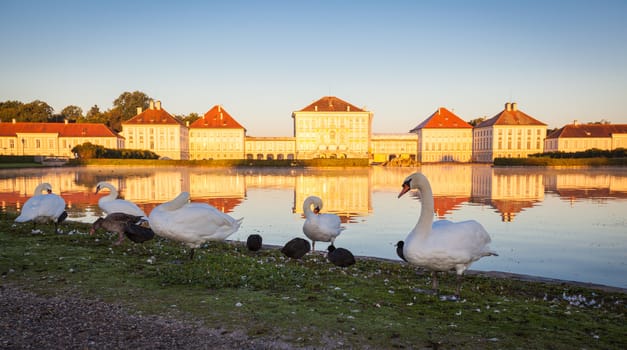 Nymphenburg palace with reflection in the morning sunlight