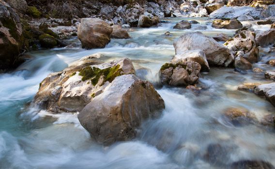 Long Exposure of water flowing down over stones