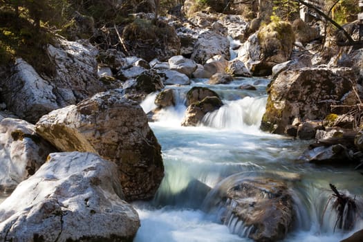 Long Exposure of water flowing down over stones