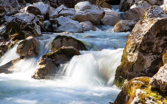 Long Exposure of water flowing down over stones