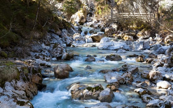 Long Exposure of water flowing down over stones