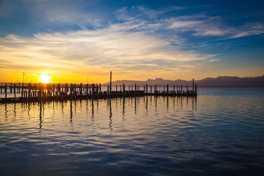Early morning at a jetty at lake Chiemsee