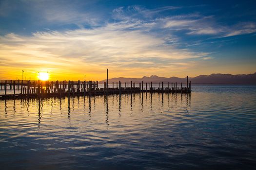 Early morning at a jetty at lake Chiemsee