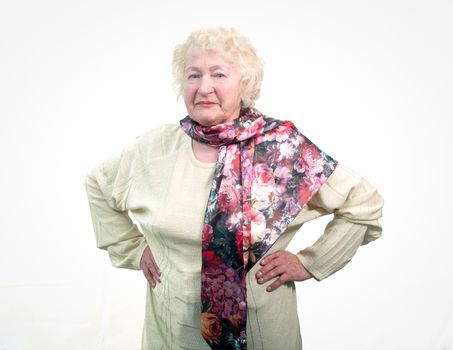 Portrait of  80 years old cheerful woman .