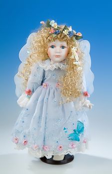 The big doll on a blue and white background