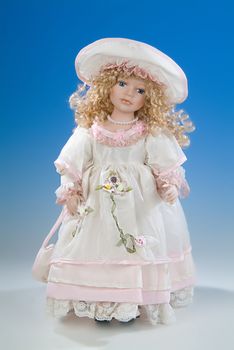 The big doll on a blue and white background