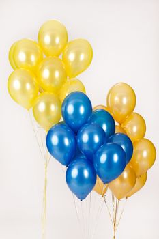 Multicoloured air balloons on isolated studio background