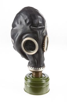 Gas mask with filter ob an isolated studio background