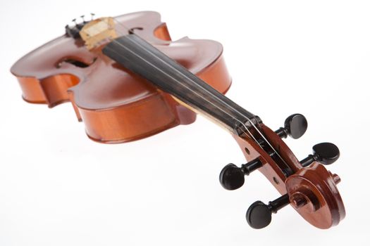 Old violin on isolated studio background