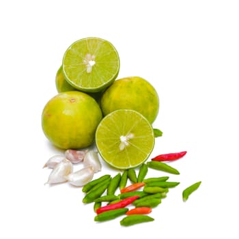 Chili peppers, garlic and lime on white background. Asian ingredients food