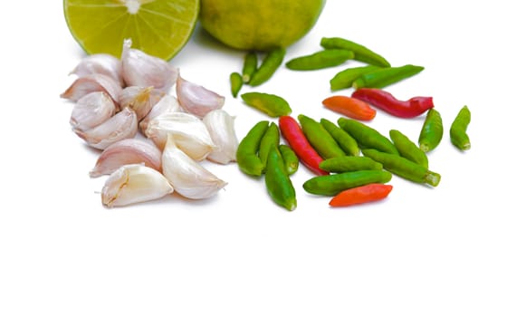 Chili peppers, garlic and lime on white background. Asian ingredients food