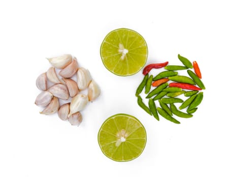 Chili peppers, garlic and lime on white background. Asian ingredients food