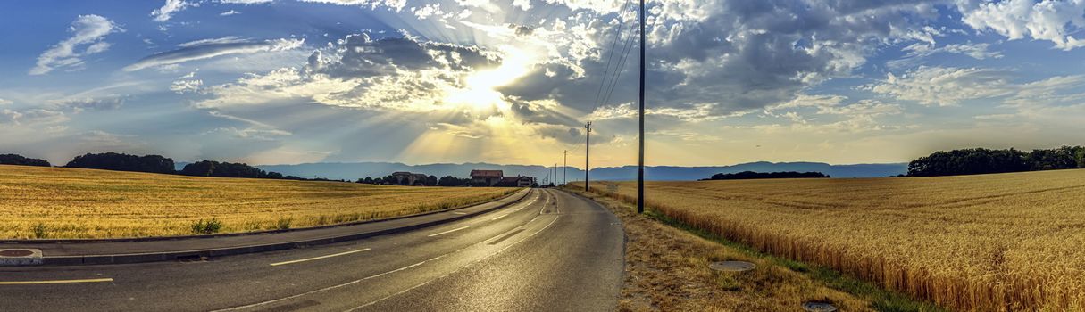 Countryside road to Jura mountain by cloudy evening, Geneva, Switzerland, HDR