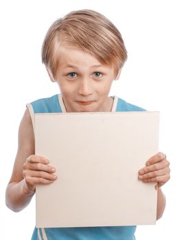 A blond boy holding a blank ad sign isolated on a white background