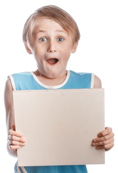 A blond boy holding a blank ad sign isolated on a white background