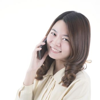 Asian woman smile with telephone in business office concept, isolated on white background