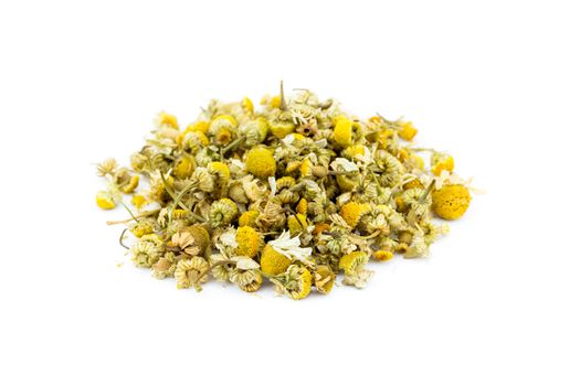 Loose chamomile tea isolated on white background