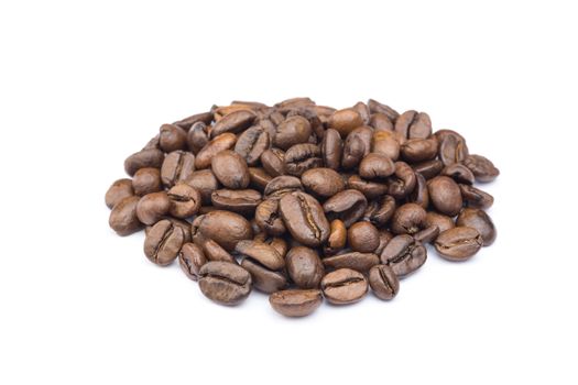 Heap of whole brown coffee beans isolated on white background