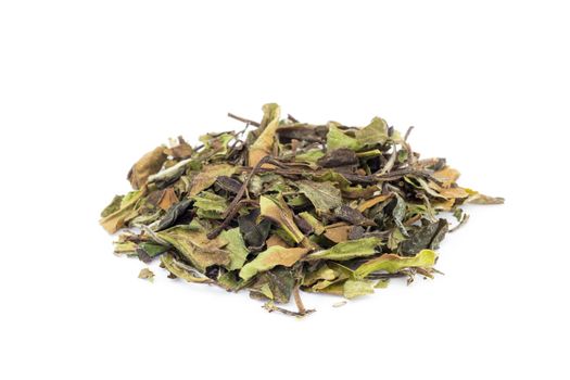 Heap of loose green leaves of white tea bai mu dan isolated on white background