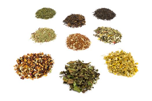 Various heaps and tastes of tea isolated on white background