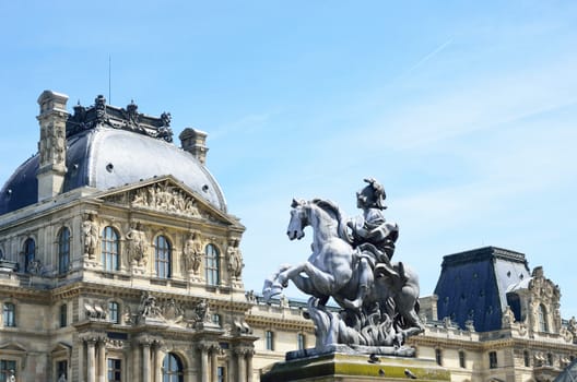 Statue of Louis ivx outside louvre museum