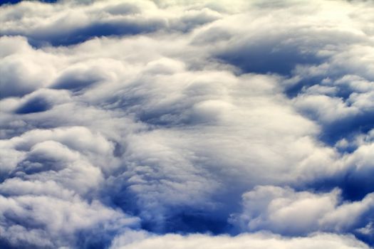 sky with clouds at a height in the air