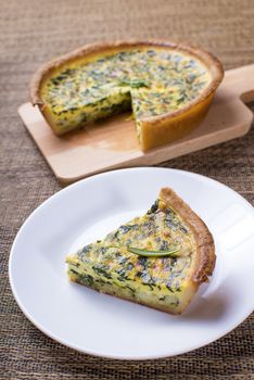 Delicious spinach quiche and smaller portion served