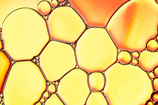 Abstract Colorful reflections on oil and soap bubbles in water