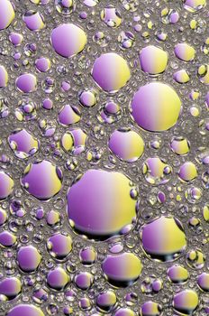 Abstract Colorful reflections on oil and soap bubbles in water