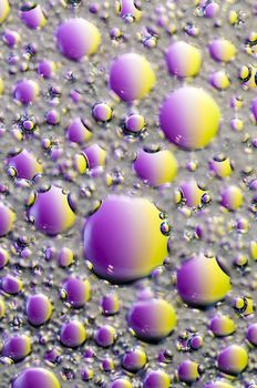 Abstract Colorful reflections on oil and soap bubbles in water