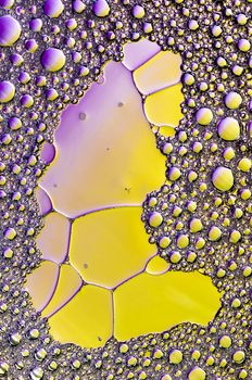 Abstract Colorful reflections on oil and soap bubbles in water