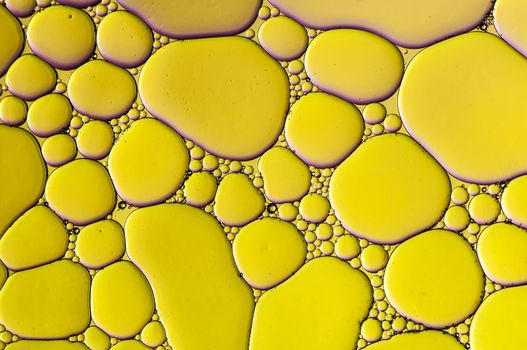 Abstract Colorful reflections on oil and soap bubbles in water