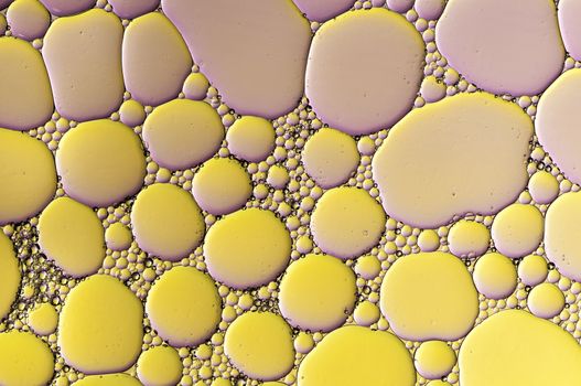 Abstract Colorful reflections on oil and soap bubbles in water