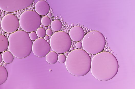 Abstract Colorful reflections on oil and soap bubbles in water