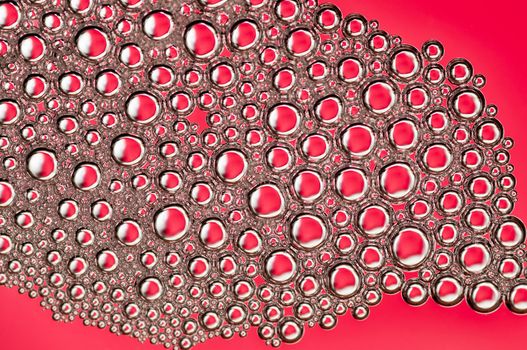 Abstract Colorful reflections on oil and soap bubbles in water