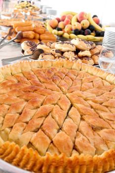 Picture of a Turkish baklava on a metal plate