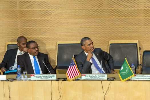 Addis Ababa - July 28: President Obama and Prime Minister Hailemariam Desalegn attentively listen to the speech of H.E. Dr. Dlamini Zuma, Chairperson of the AUC, on July 28, 2015, in Addis Ababa, Ethiopia.