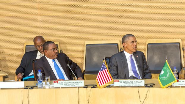 Addis Ababa - July 28: President Obama and Prime Minister Hailemariam Desalegn attentively listen to the speech of H.E. Dr. Dlamini Zuma, Chairperson of the AUC, on July 28, 2015, in Addis Ababa, Ethiopia.