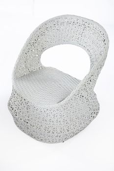 Armchair made from synthetic fibre on isolated background