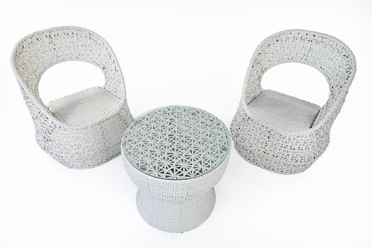Suite of wicker furniture made of synthetic fibre on isolated background