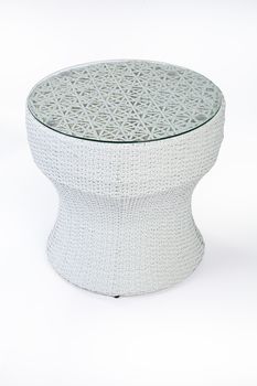 Wicker table made of synthetic fibre on isolated background