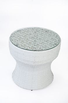 Wicker table made of synthetic fibre on isolated background