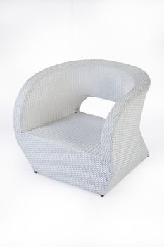 Armchair made from synthetic fibre on isolated background