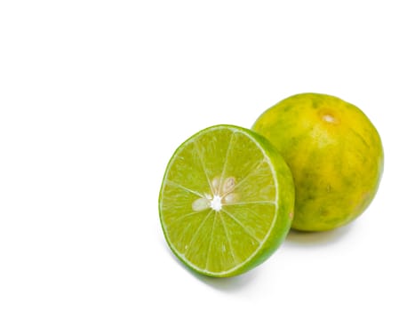 Juicy slices of lime isolated on white background.