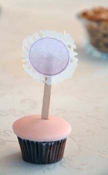 Picture of a birthday Cupcakes in a plastic cans